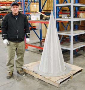 Sean stranding beside 30 inch custom fabricated cone strainer